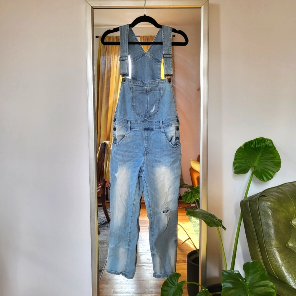Light blue distressed denim overalls, small
